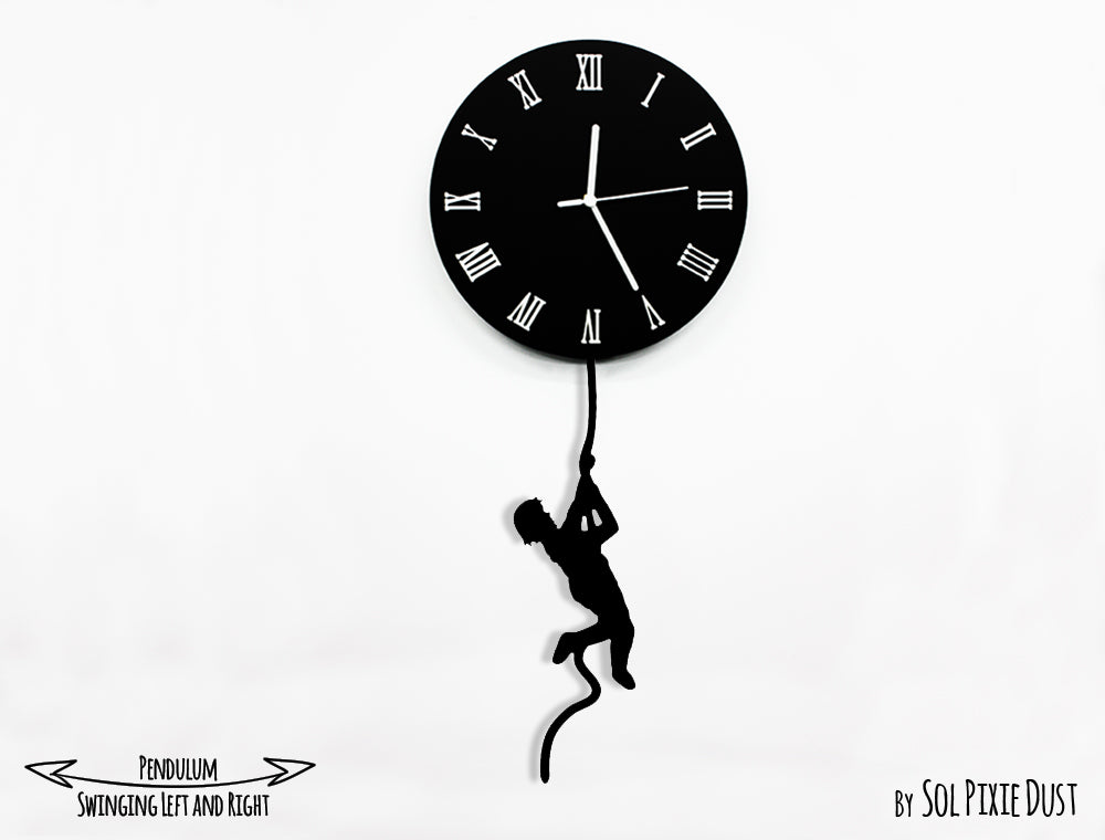 Boy climbing on The Moon - Pendulum Wall Clock