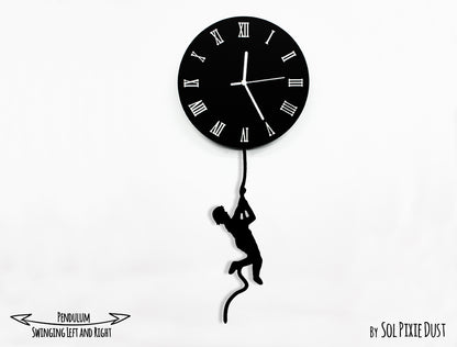 Boy climbing on The Moon - Pendulum Wall Clock